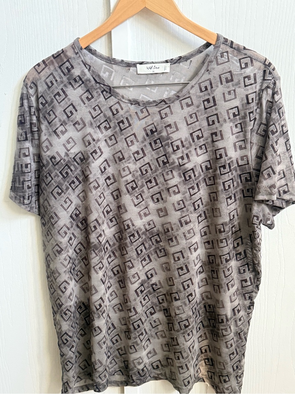 Wild Love women's mesh top features a gray geometric Greek key print in a sheer,